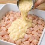 Pour cream of chicken soup over raw diced chicken breast, along with 3 ingredients