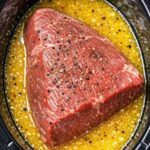 Dump a raw sirloin tip roast in the slow cooker alongside 4 more simple items